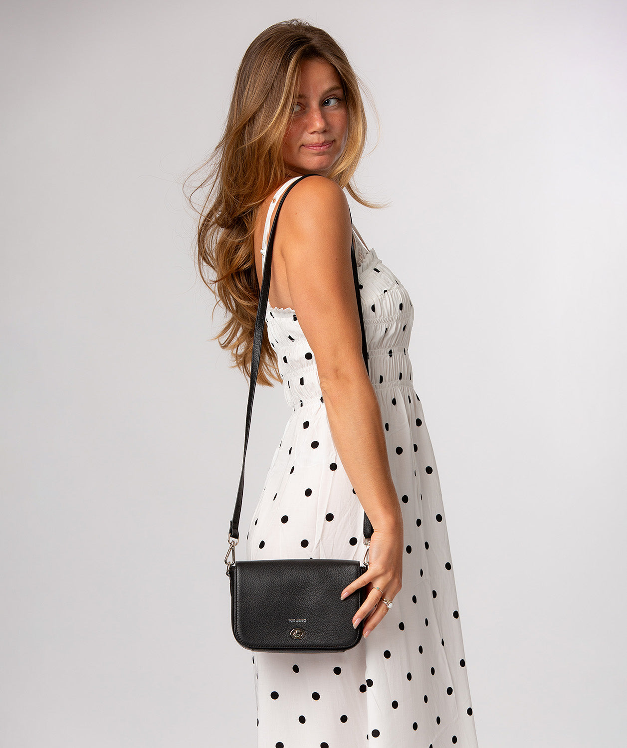 Briony bag fold-over top with silver twist lock fastener detail
