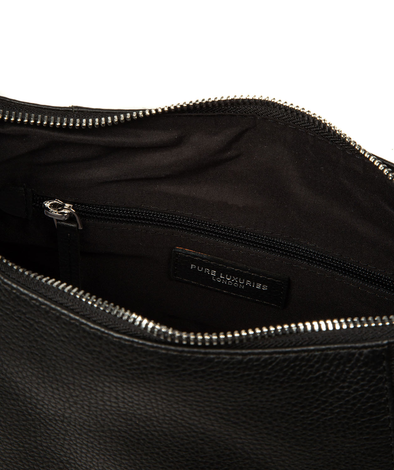 Interior organised storage with slip and zipped pockets