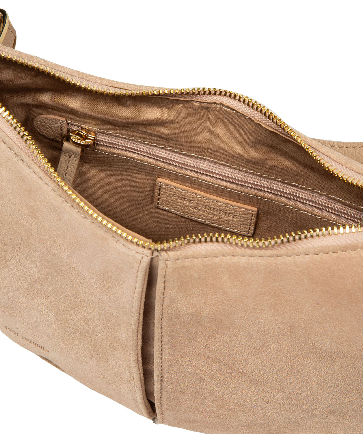 Top-down view of latte suede evening bag