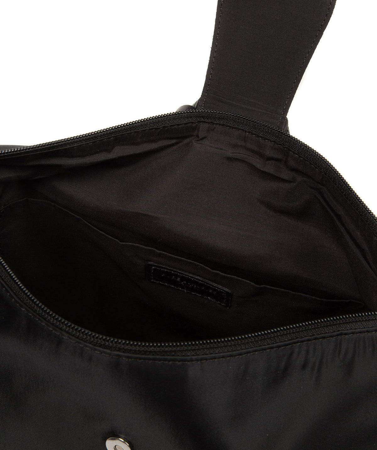 Interior fully lined compartment with slip pocket