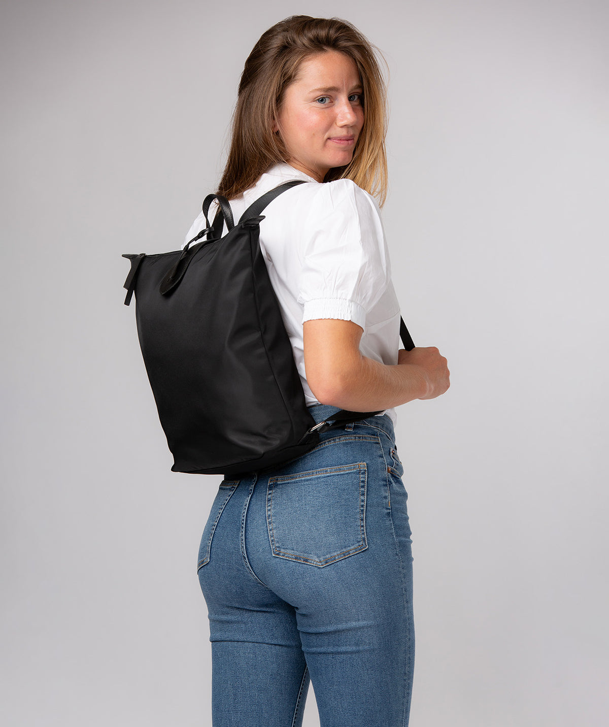 Side profile showing leather trim and construction