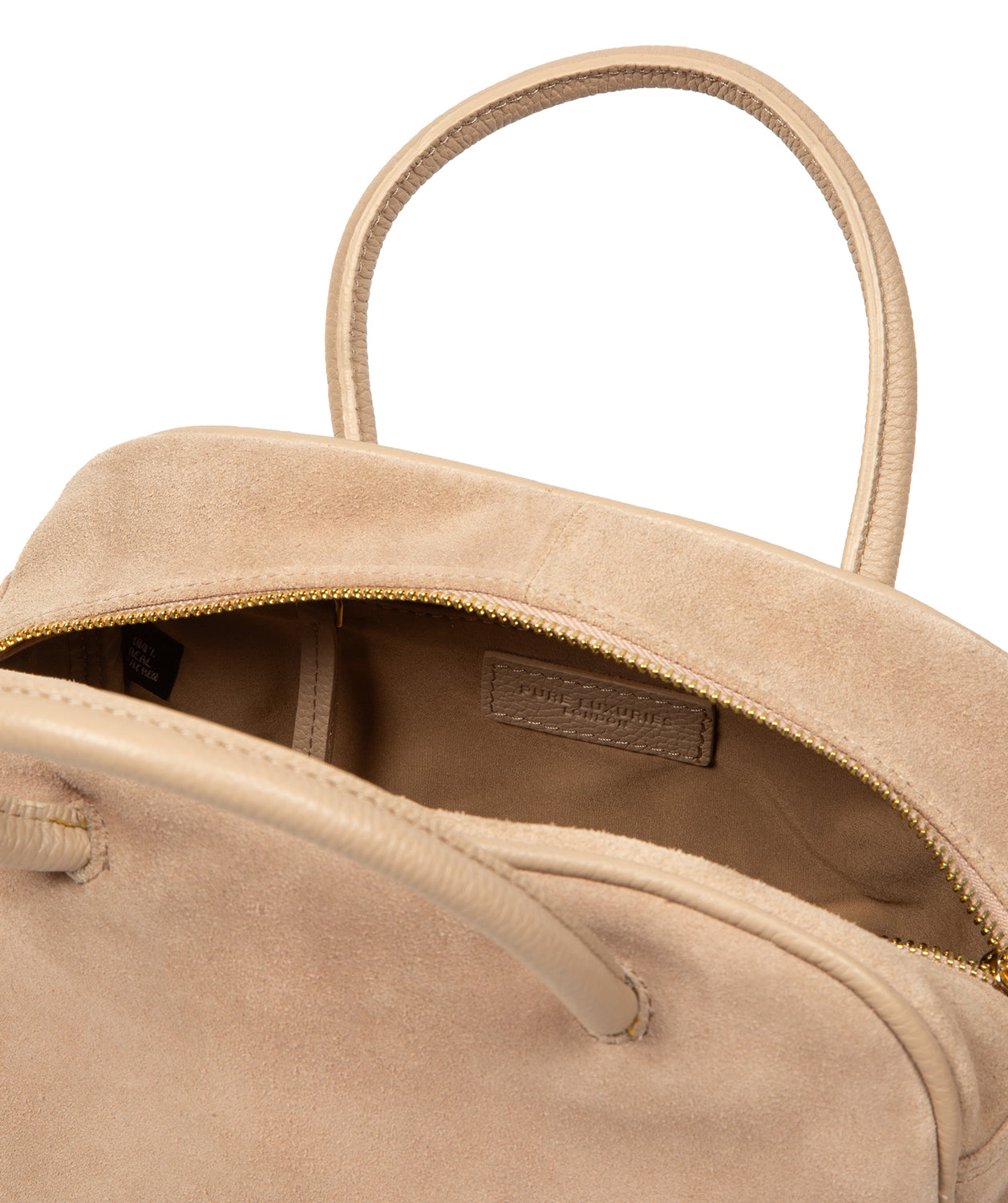 Blind-embossed Pure Luxuries logo and branded charm detail