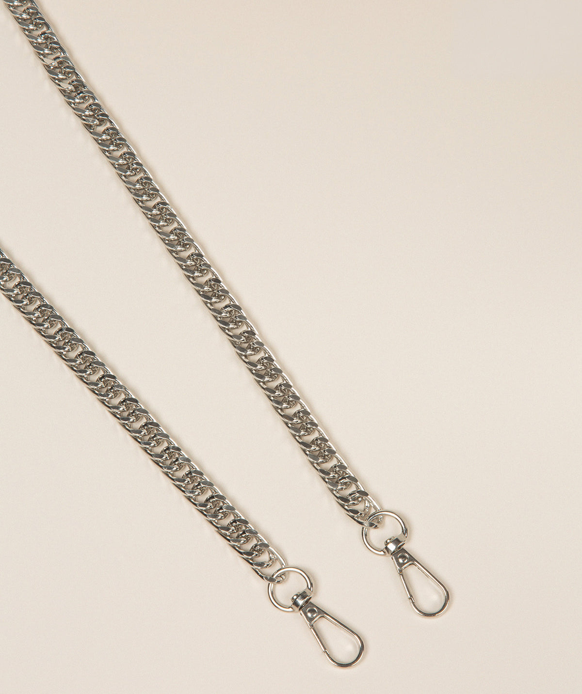 Pure Luxuries silver flat curb chain strap full length view