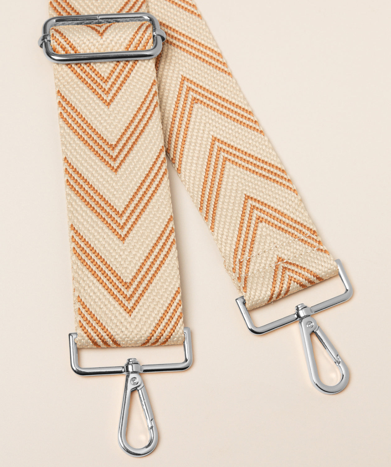 Pure Luxuries terracotta and cream canvas chevron bag strap with silver hardware