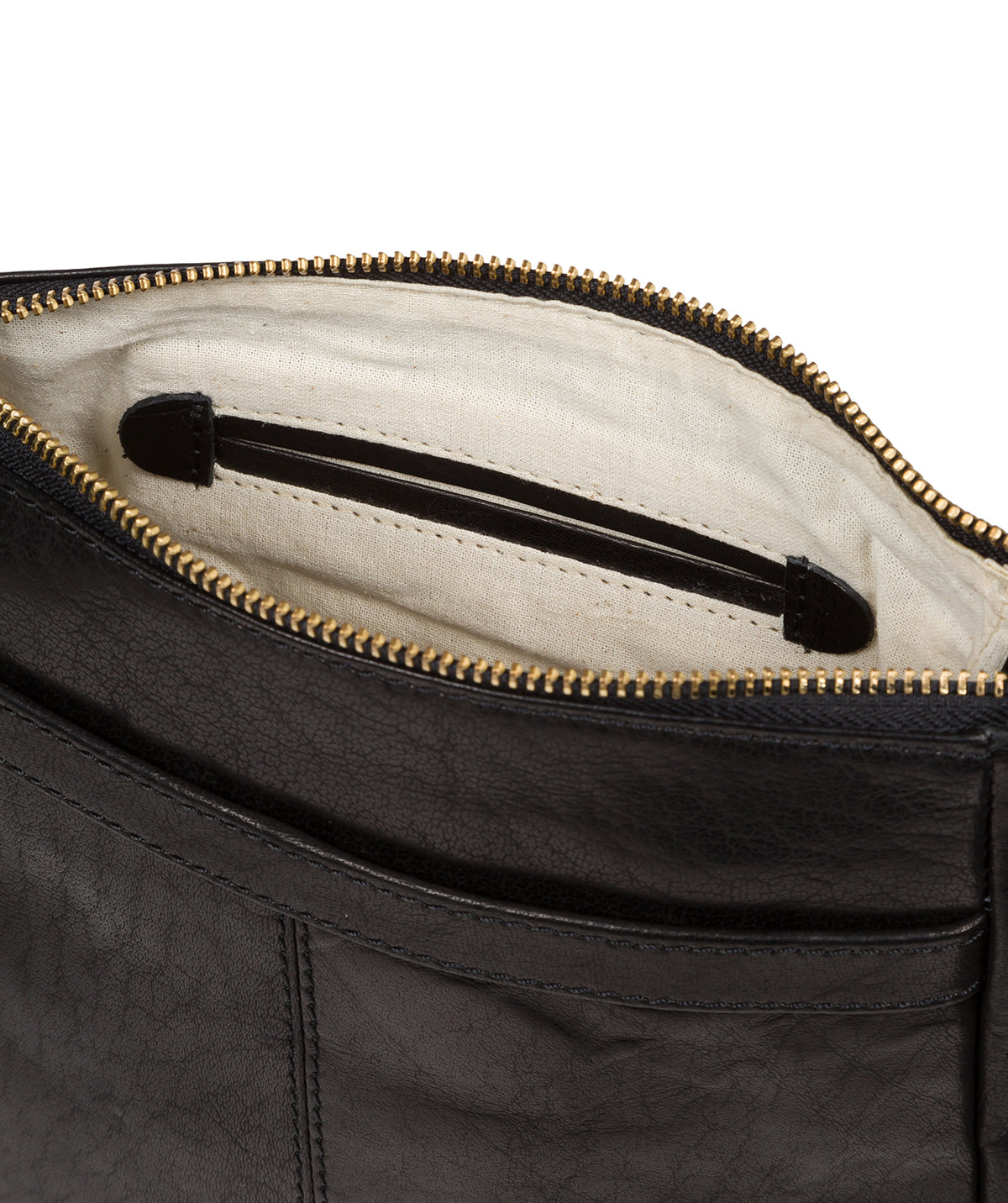 hand-finished leather grain and patina close-up detail