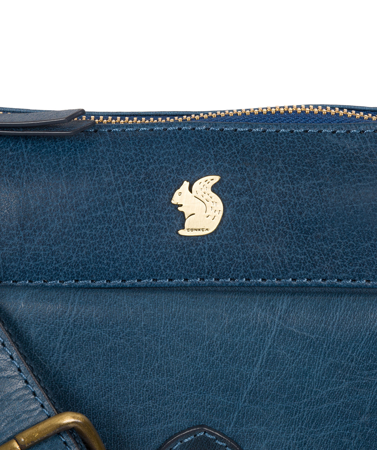 hand-finished craftsmanship and leather patina detail