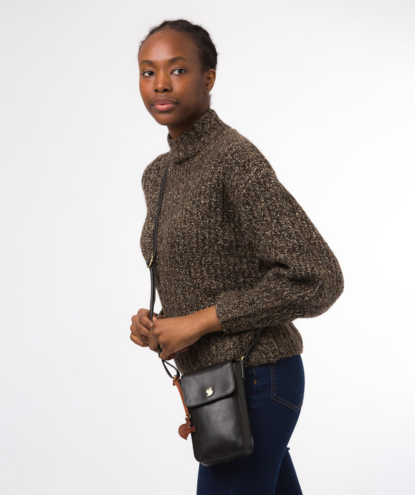 Conkca London Originals Collection #product-type#: 'Buzz' Black Leather Cross Body Phone Bag