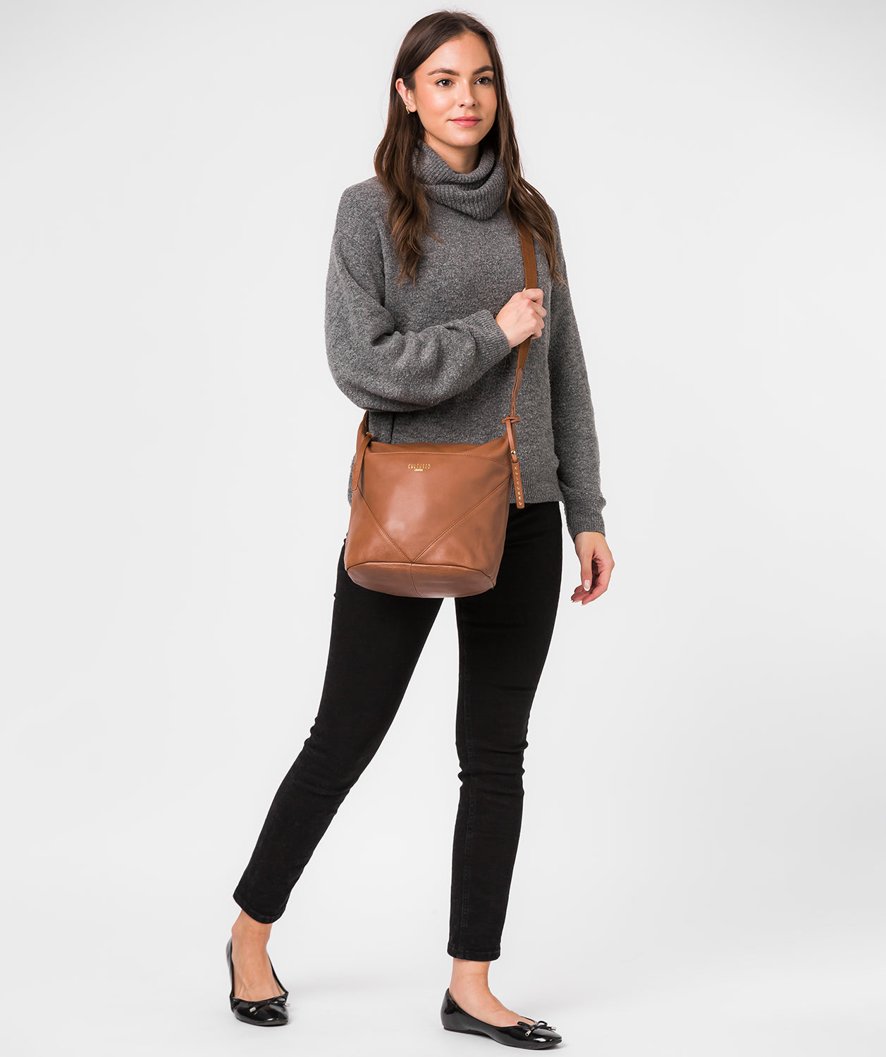 Chelsea shoulder bag side profile showing structured silhouette