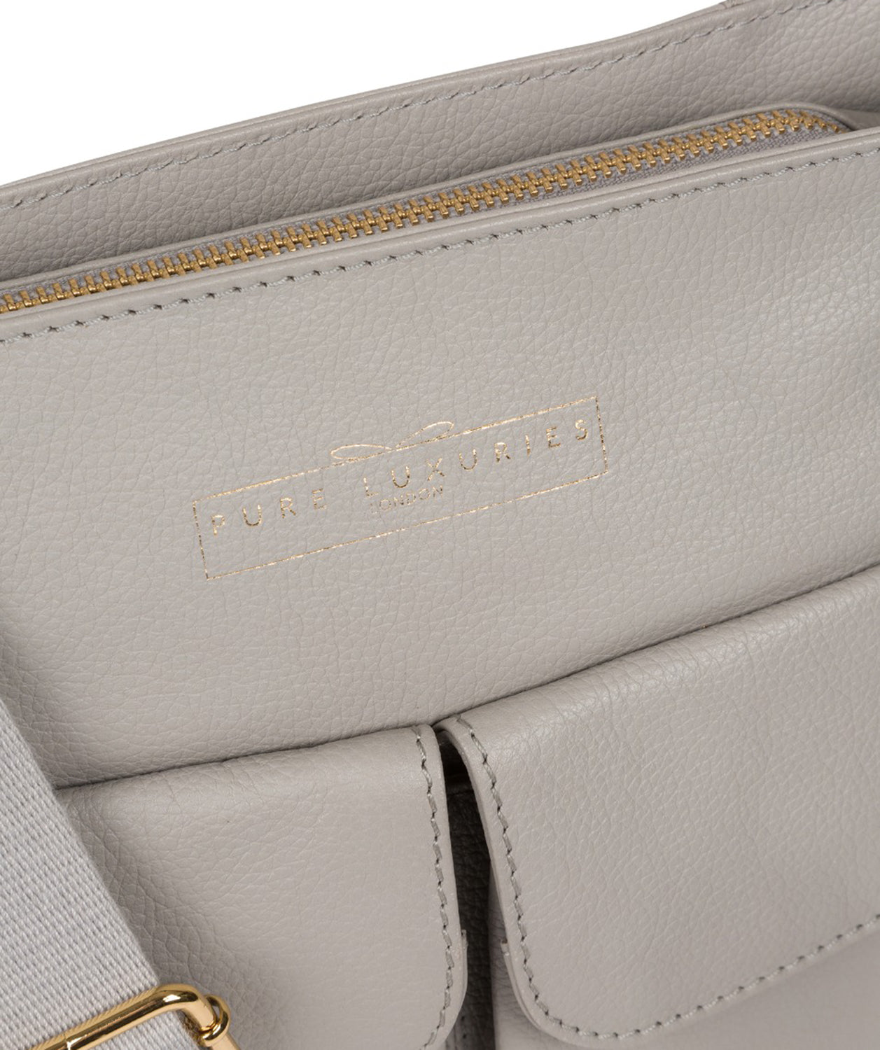 Leather crossbody bag magnetic closure detail